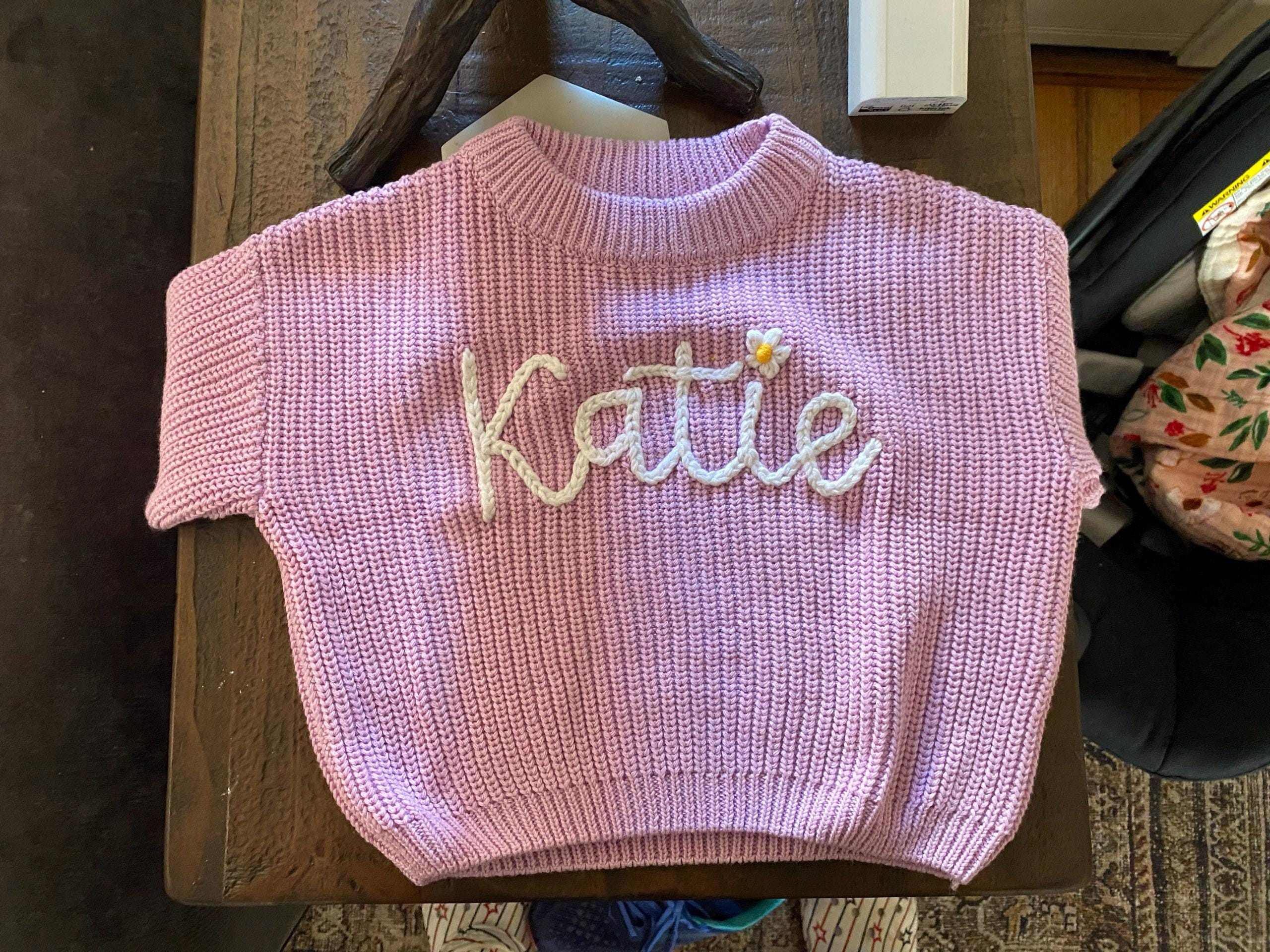 Cherished Custom Baby Sweaters: Personalize Their Name with Exquisite Embroidery