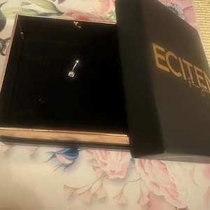 Alexandra Ioana Radu added a photo of their purchase