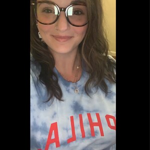 Sarah added a photo of their purchase
