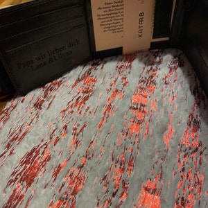 Gina added a photo of their purchase