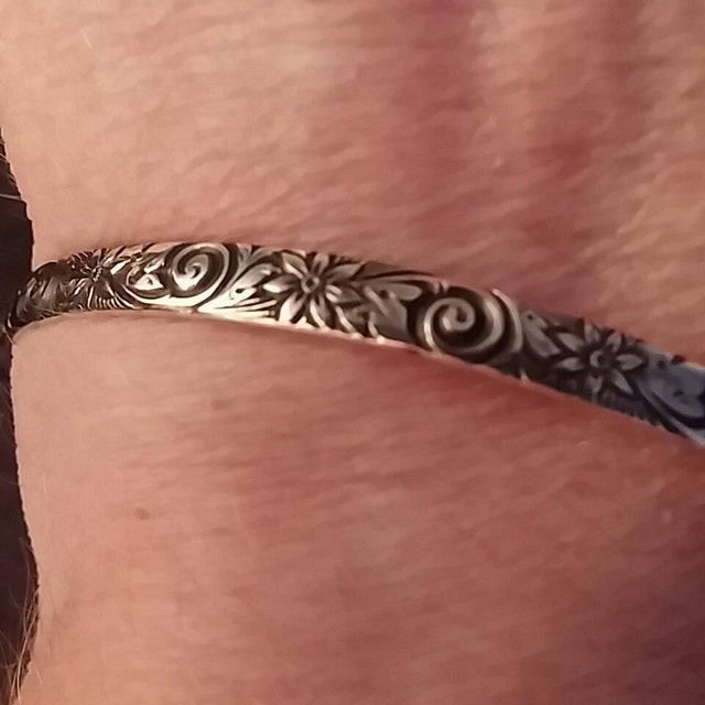 Sterling Silver Bangle Bracelet With Spiral and Flower