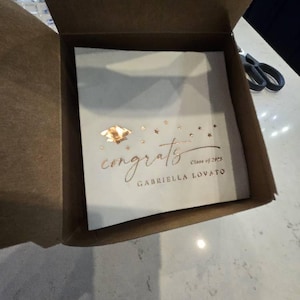 Angela added a photo of their purchase