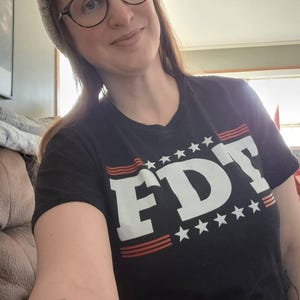 Sarah added a photo of their purchase