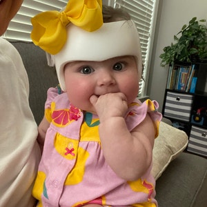 baby flat head helmet cost australia