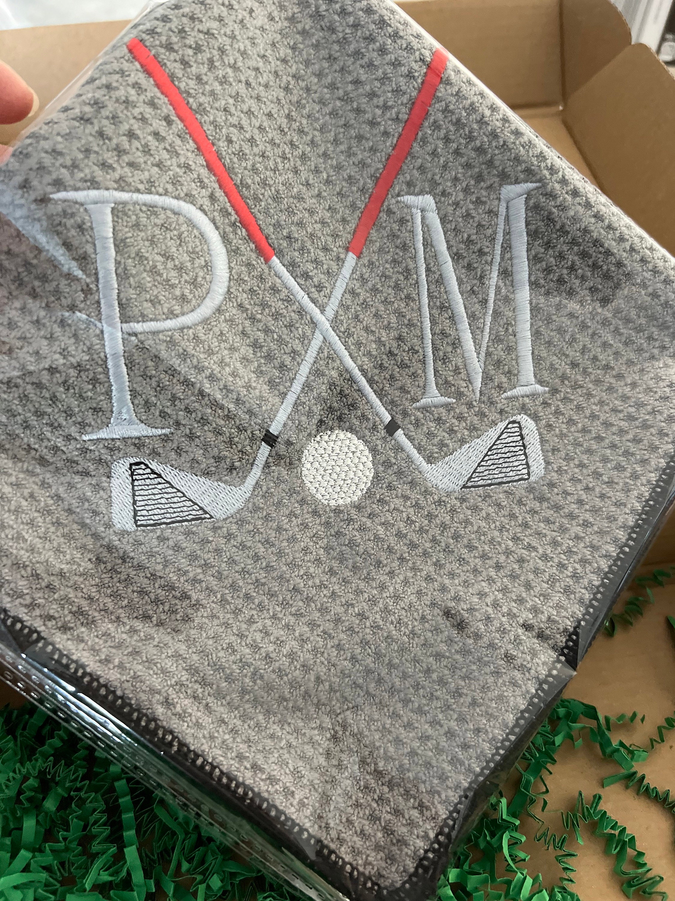 Personalized Golf Gift Box. Include a golf towel, a set of three golf Pro V1 balls with monograms, and a golf bag tag with tee holder
