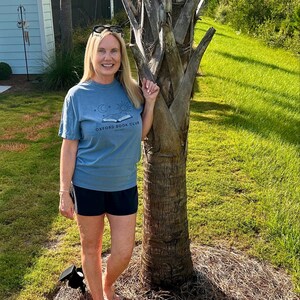 Sarah added a photo of their purchase