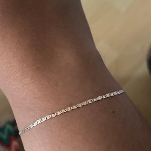 Angelica added a photo of their purchase