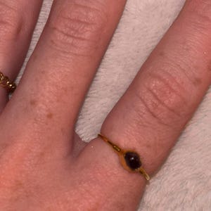Customer photo from Emily Bridge, Dainty Raw Garnet Ring