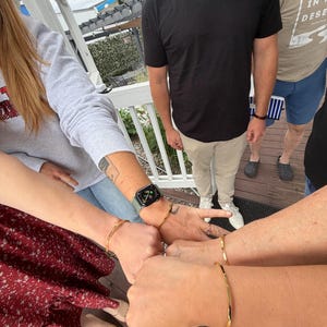 Christina added a photo of their purchase