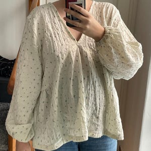 Nina added a photo of their purchase