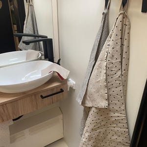 Sabina added a photo of their purchase