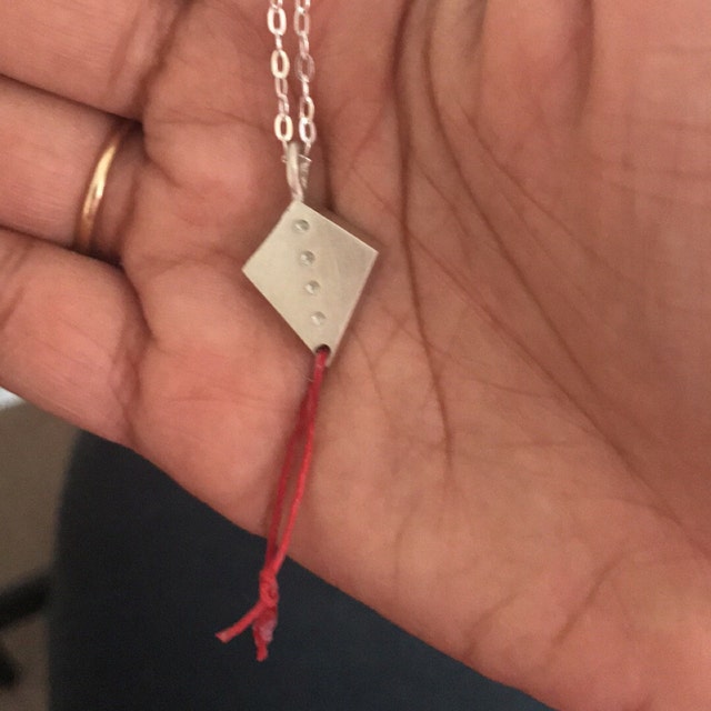 Kite necklace with shop red string