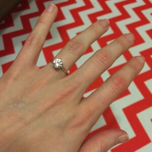 Rebekah added a photo of their purchase