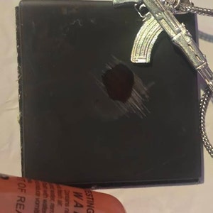 Christopher added a photo of their purchase