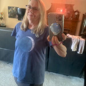 Sandra added a photo of their purchase