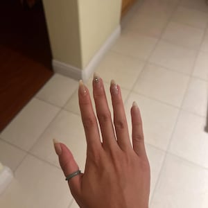 Mia added a photo of their purchase