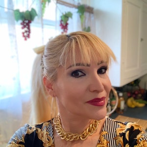 Migdalia added a photo of their purchase