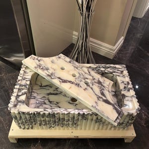 Patricia added a photo of their purchase