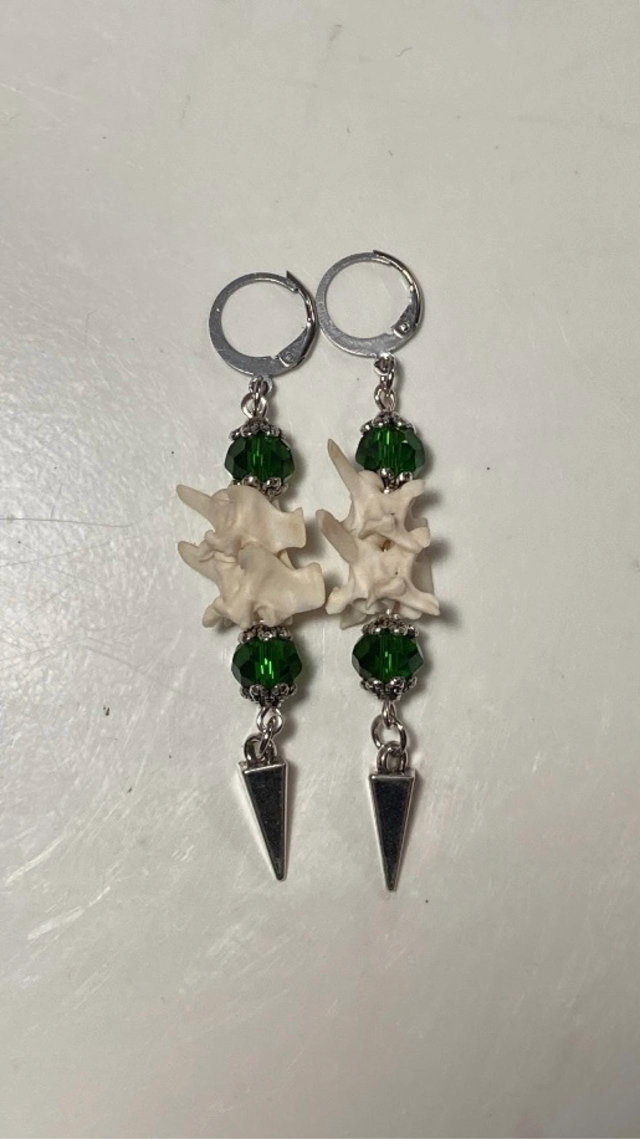 Exquisite Victorian-Era Inspired Coiled Rattlesnake Vertebrae Dangling, Earrings with Intricate Metalwork and Antique Brass Finish