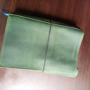 Laura added a photo of their purchase