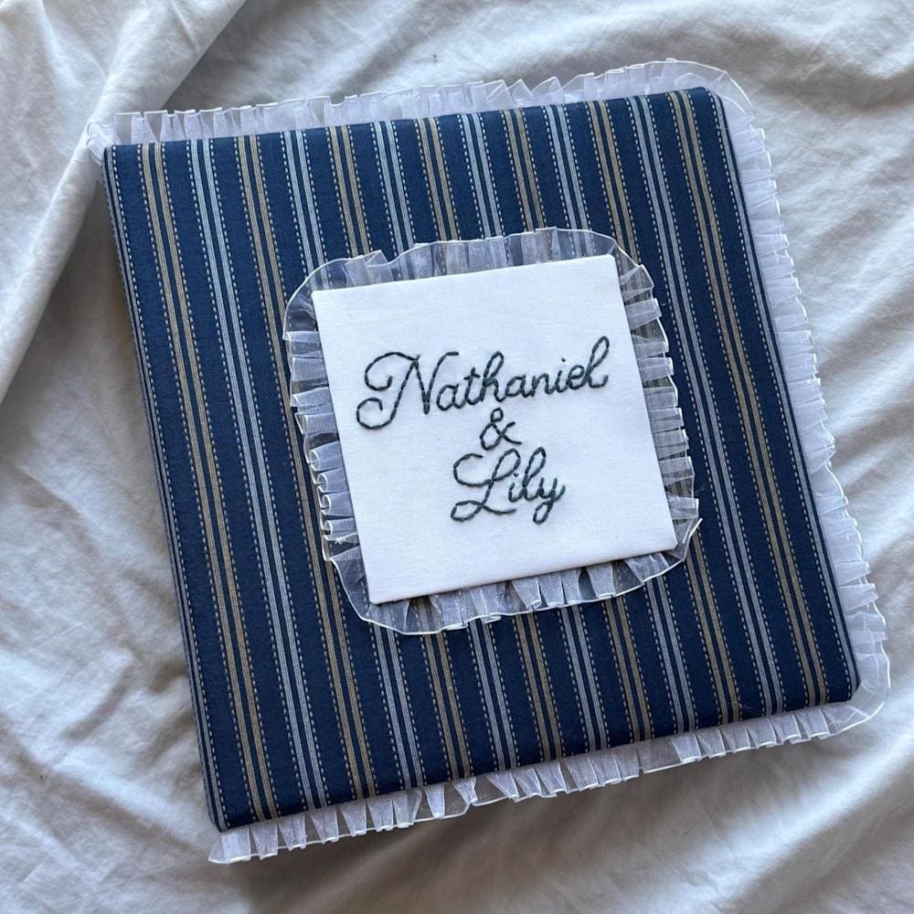 Personalized embroidered fabric scrapbook