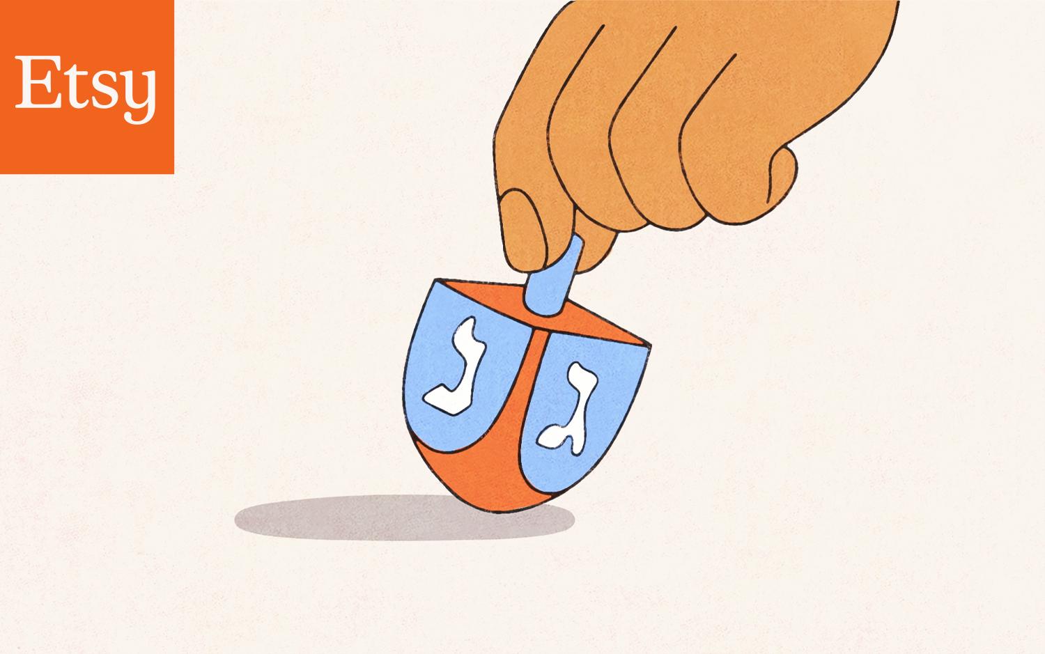 Hand spinning a dreidel