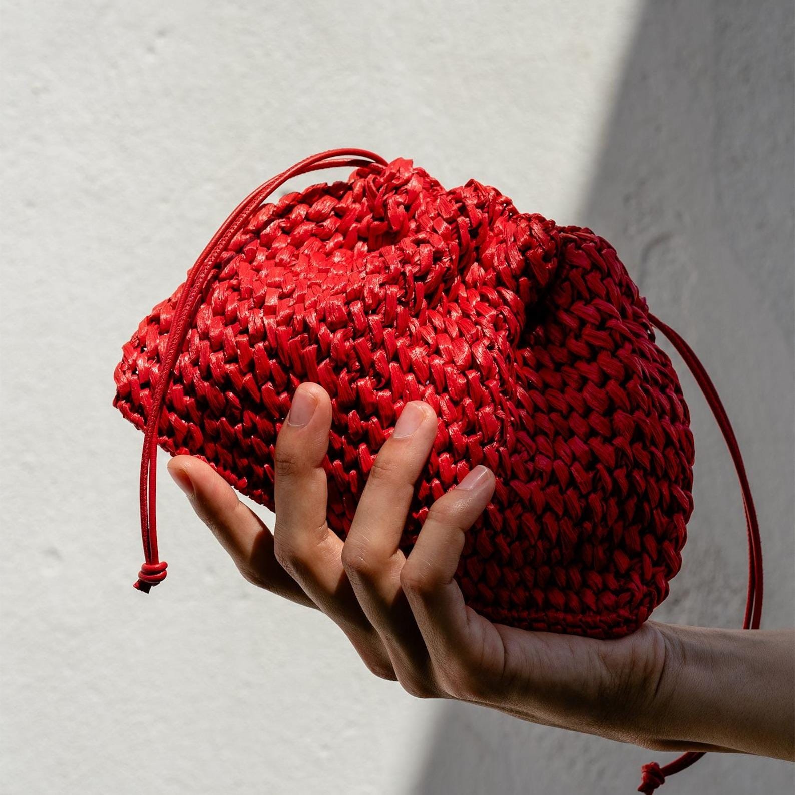 Bolso clutch de rafia rojo