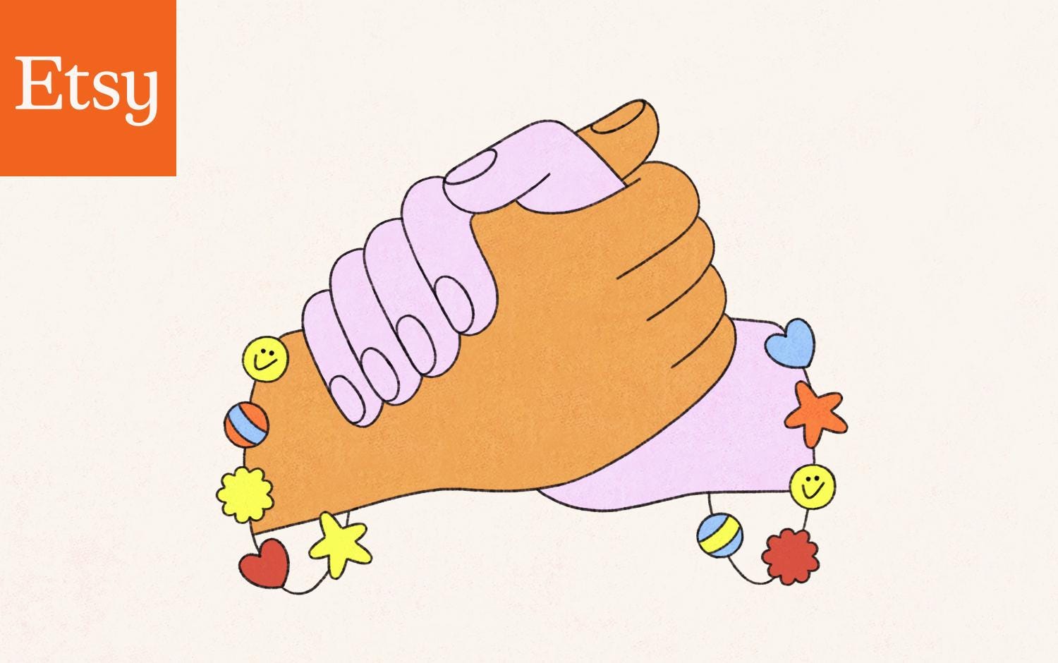 Two hands are clasped with matching friendship bracelets on their wrists