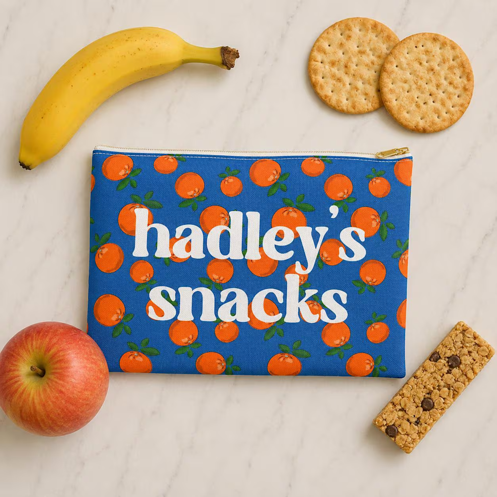 Blue personalized snack pouch with orange print