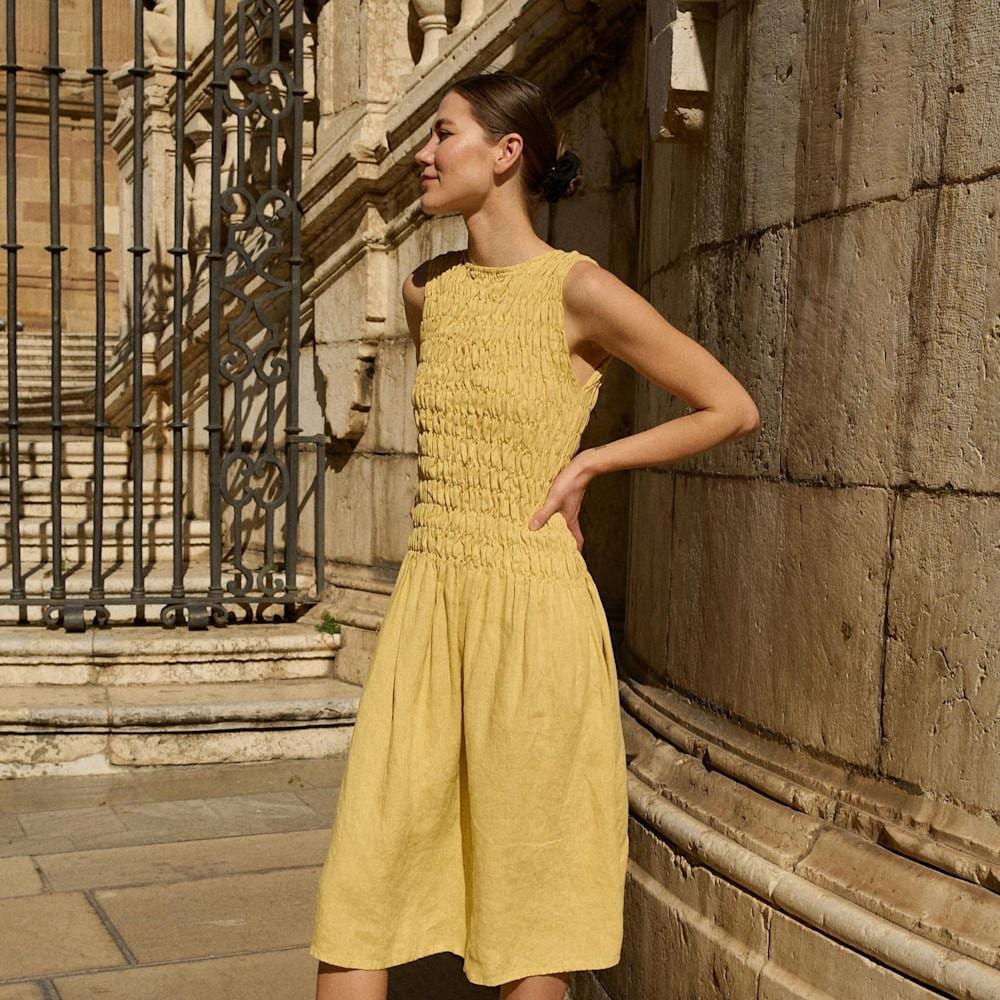 Yellow smocked gingham dress