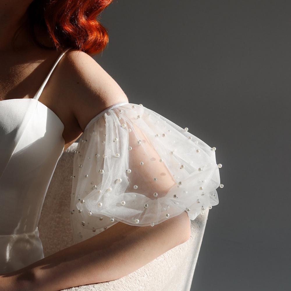 White tulle detachable puff sleeve covered in pearls