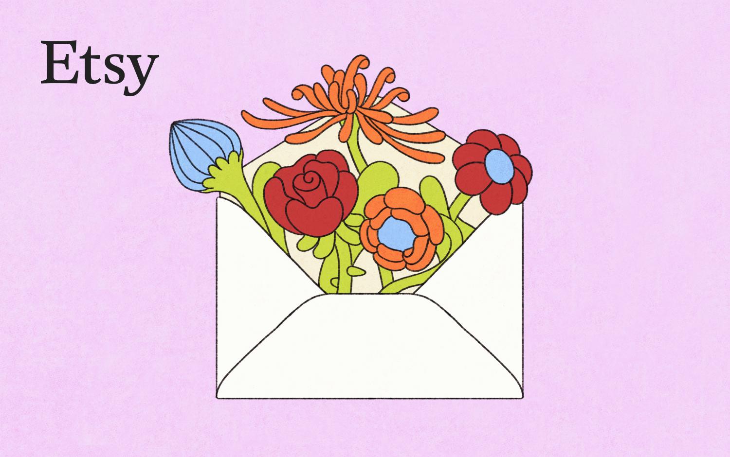 A white envelope is open with beautiful, colorful flowers coming out of it