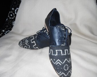mud clothes and leather shoes