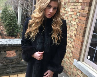 Marvin Richards black coat
