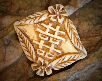 Bone bead #31...Double Happiness bead in carved bone