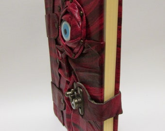 Leather journal notebook with eye emblem