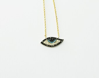 Dainty evil eye pendant