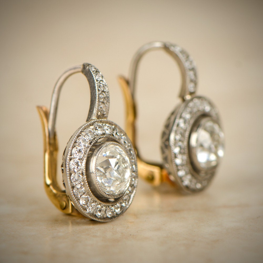 Old European Cut Diamond Halo Platinum and Gold Earrings.