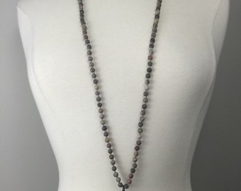 Hand knotted beaded necklace with soldered arrowhead