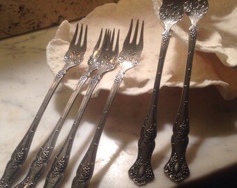 Antique set of seafood forks