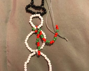 Snowman ornament and reindeer magnet