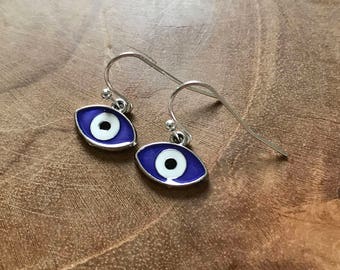 Evil eye - silvertone dangling earrings with evil eye charm colored in with blue, white and black. boho, ethnic, earrings, cute, protection