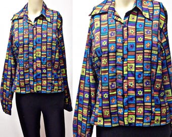 FLower power,funky ,bright flowers on black polyester,blouse