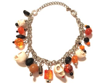 Halloween Skull Bracelet. Black and Orange with White Skulls.