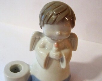 Little ceramic angelshaped candle holder