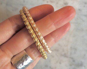 Bracelet jonc fleur ajustable
