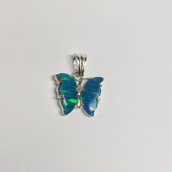 Opal butterfly pendant in sterling silver
