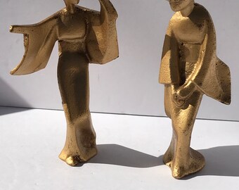 Vintage gold color metal art deco statues very heavy. omc Otagiri mercantile company Japan