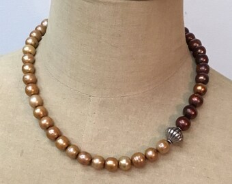 Handmade two-toned freshwater pearl necklace with sterling silver accent bead