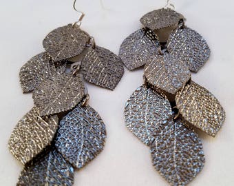 Silver cascade of leaves earrings.